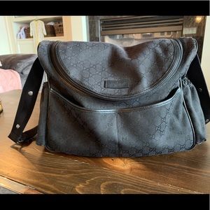 Gucci canvas diaper bag with change pad
